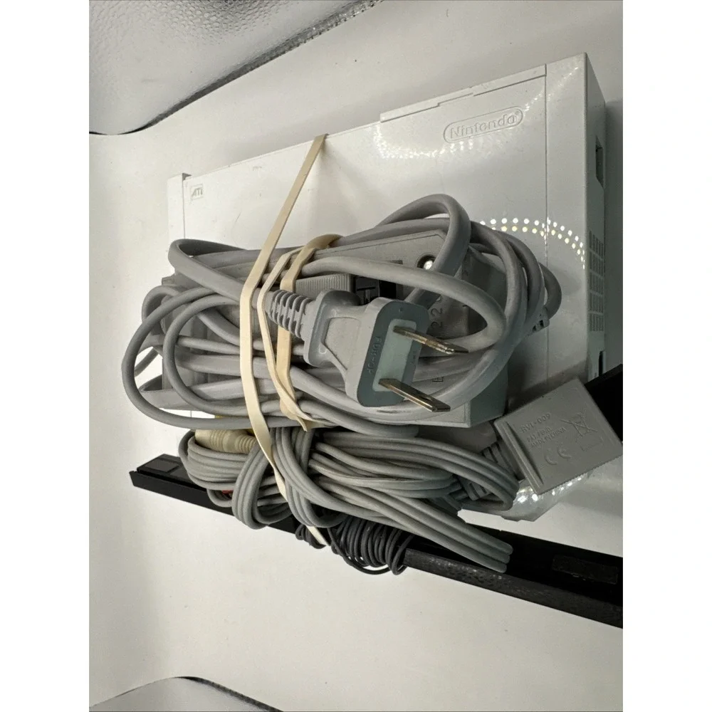 Nintendo Wii White Console with Gray Cables and Black Sensor Bar